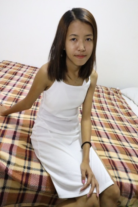 Sweet Asian skinny babe Angel F strips and gets pounded from behind