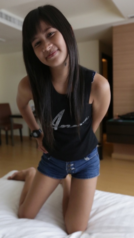 Beautiful Asian girl Nok does a sexy striptease and enjoys a hardcore POV bang