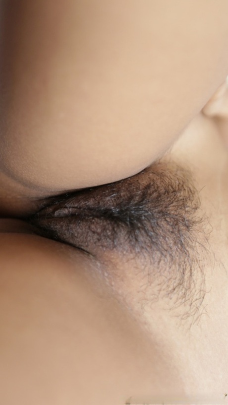 Pretty Asian babe Tun B shows her hairy pussy before & after sex