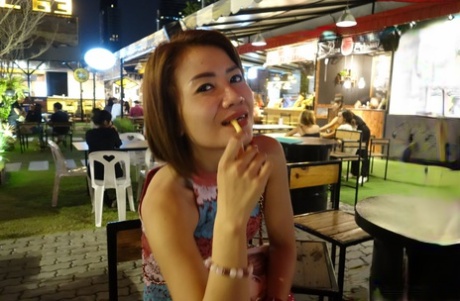 Asian babe Nan B shows off her petite body while stripping for some POV sex