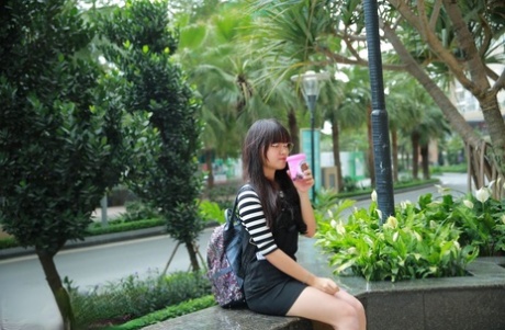 Little Asian teen poses in her cute outfit in her public compilation