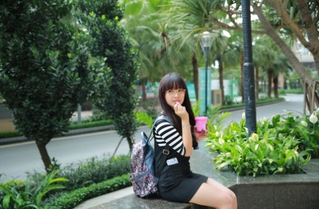 Little Asian teen poses in her cute outfit in her public compilation